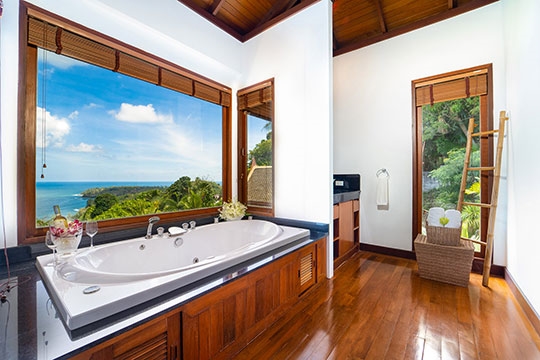 Master bedroom ensuite bathroom with stunning sea view